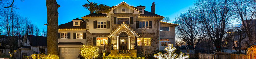 house lit with holiday christmas lights